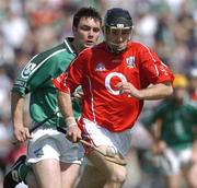 30 May 2004; Ben O'Connor, Cork, in action against Peter Lawlor, Limerick. Guinness Munster Senior Hurling Championship Semi-Final, Limerick v Cork, Gaelic Grounds, Limerick. Picture credit; Ray McManus / SPORTSFILE