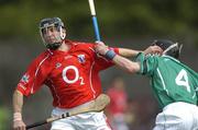 30 May 2004; Ben O'Connor, Cork, is tackled by Mickey Cahill, Limerick. Guinness Munster Senior Hurling Championship Semi-Final, Limerick v Cork, Gaelic Grounds, Limerick. Picture credit; Ray McManus / SPORTSFILE