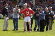 30 May 2004; Cork captain Ben O'Connor is the centre of media attention before the start of the game. Guinness Munster Senior Hurling Championship Semi-Final, Limerick v Cork, Gaelic Grounds, Limerick. Picture credit; Ray McManus / SPORTSFILE