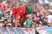 30 May 2004; Jonathan O'Callaghan, Cork, returns to the pitch after ending up in the crowd. Guinness Munster Senior Hurling Championship Semi-Final, Limerick v Cork, Gaelic Grounds, Limerick. Picture credit; Ray McManus / SPORTSFILE