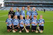 11 August 2013; The Dublin camogie team, back row, left to right, referee Kate Corcoran, Aoife Traynor, Anna Caslin, Ella O'Connor, Martina Tansey, front row, left to right, Lorna O'Carroll, Saoirse Fitzgerald, Deirbhle Dugan, Lauren Burke, Amy Maher, Aimee Collier before the INTO/RESPECT Exhibition GoGames at the GAA Hurling All-Ireland Senior Championship Semi-Final between Dublin and Cork. Croke Park, Dublin. Picture credit: Dáire Brennan / SPORTSFILE