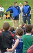 13 August 2013; Leinster players Brian O'Driscoll, left, and Fergus McFadden, speaking to camp participants during a Leinster Rugby Summer Camp at DLSP RFC, Kirwan Park, Kilternan, Co. Dublin. Picture credit: Brian Lawless / SPORTSFILE