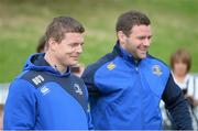 13 August 2013; Leinster players Brian O'Driscoll, left, and Fergus McFadden, speak to camp participants during a Leinster Rugby Summer Camp at DLSP RFC, Kirwan Park, Kilternan, Co. Dublin. Picture credit: Brian Lawless / SPORTSFILE