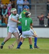 13 August 2013; Niall Quinn, Jim Bolger's Stars, in action against Mark Landers, left, and Ian McCarthy, Davy Russell's Best. Hurling for Cancer Research 2013, Jim Bolger's Stars v Davy Russell's Best, St. Conleth’s Park, Newbridge, Co. Kildare. Picture credit: Barry Cregg / SPORTSFILE