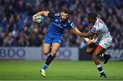 8 October 2022; Robbie Henshaw of Leinster is tackled by Aphelele Fassi of Cell C Sharks during the United Rugby Championship match between Leinster and Cell C Sharks at RDS Arena in Dublin. Photo by Brendan Moran/Sportsfile