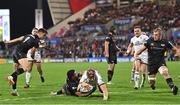 8 October 2022; Luke Marshall of Ulster dives over to score his side's first try during the United Rugby Championship match between Ulster and Ospreys at Kingspan Stadium in Belfast. Photo by Ramsey Cardy/Sportsfile