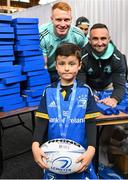 8 October 2022; Mascot Oran McConville with Ciarán Frawley and Dave Kearney of Leinster at the United Rugby Championship match between Leinster and Cell C Sharks at RDS Arena in Dublin. Photo by Harry Murphy/Sportsfile