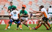 9 October 2022; Robert Baloucoune of Emerging Ireland is tackled by Siya Masuku of Toyota Cheetahs during the Toyota Challenge match between Toyota Cheetahs and Emerging Ireland at Toyota Stadium in Bloemfontein, South Africa. Photo by Johan Pretorius/Sportsfile
