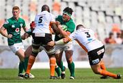 9 October 2022; Tom Clarkson of Emerging Ireland is tackled by Victor Sekekete, left, and Marne Coetzee of Toyota Cheetahs during the Toyota Challenge match between Toyota Cheetahs and Emerging Ireland at Toyota Stadium in Bloemfontein, South Africa. Photo by Johan Pretorius/Sportsfile