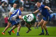 9 October 2022; John Murray of  Baltinglass in action against Bryan Doyle and Dean Healy of St Patrick's during the Wicklow County Senior Football Championship Final match between Baltinglass and St Patrick's at the County Grounds in Aughrim, Wicklow. Photo by Harry Murphy/Sportsfile