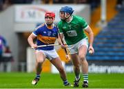 9 October 2022; Michael Campion of Drom and Inch in action against Bryan McLoughney of Kiladangan during the Tipperary County Senior Hurling Championship Semi-Final match between Drom and Inch and Kiladangan at FBD Semple Stadium in Thurles, Tipperary. Photo by Michael P Ryan/Sportsfile