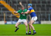 9 October 2022; Kevin Hassett of Drom and Inch in action against Joe Gallagher of Kiladangan during the Tipperary County Senior Hurling Championship Semi-Final match between Drom and Inch and Kiladangan at FBD Semple Stadium in Thurles, Tipperary. Photo by Michael P Ryan/Sportsfile