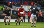 9 October 2022; Stephen O’Brien of Kenmare Shamrocks in action against Dan O'Brien and Ronan Buckley of East Kerry during the Kerry County Senior Club Football Championship quarter-final match between East Kerry and Kenmare Shamrocks at Fitzgerald Stadium in Killarney, Kerry. Photo by Brendan Moran/Sportsfile