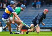 9 October 2022; Drom and Inch goalkeeper Eoin Collins of Drom and Inch clears a ball under pressure from Billy Seymore of Kiladangan during the Tipperary County Senior Hurling Championship Semi-Final match between Drom and Inch and Kiladangan at FBD Semple Stadium in Thurles, Tipperary. Photo by Michael P Ryan/Sportsfile