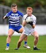 9 October 2022; Harry O'Neill of Clane in action against Tom Browne of Naas during the Kildare County Senior Football Championship Final match between Clane and Naas at St Conleth's Park in Newbridge, Kildare. Photo by Piaras Ó Mídheach/Sportsfile