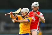 9 October 2022; Tom Brennan of Na Fianna is tackled by Colm Cronin of Cuala during the Go Ahead Dublin County Senior Club Hurling Championship Semi-Final match between Cuala and Na Fianna at Parnell Park in Dublin. Photo by Ben McShane/Sportsfile