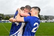 9 October 2022; Thomas Kelly of St Patrick's, centre, celebrates with teammates Ciarán McGettigan and Jack Dunne after their side's victory in the Wicklow County Senior Football Championship Final match between Baltinglass and St Patrick's at the County Grounds in Aughrim, Wicklow. Photo by Harry Murphy/Sportsfile