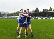 9 October 2022; Thomas Kelly of St Patrick's, centre, celebrates with teammates Ciarán McGettigan and Jack Dunne after their side's victory in the Wicklow County Senior Football Championship Final match between Baltinglass and St Patrick's at the County Grounds in Aughrim, Wicklow. Photo by Harry Murphy/Sportsfile