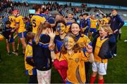9 October 2022; Young Na Fianna supporters celebrate after the Go Ahead Dublin County Senior Club Hurling Championship Semi-Final match between Cuala and Na Fianna at Parnell Park in Dublin. Photo by Ben McShane/Sportsfile