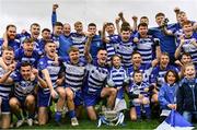 9 October 2022; Naas players celebrate with the Dermot Bourke Cup after their side's victory in the Kildare County Senior Football Championship Final match between Clane and Naas at St Conleth's Park in Newbridge, Kildare. Photo by Piaras Ó Mídheach/Sportsfile