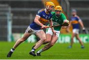 9 October 2022; Sean Hayes of Kiladangan in action against Podge Campion of Drom and Inch during the Tipperary County Senior Hurling Championship Semi-Final match between Drom and Inch and Kiladangan at FBD Semple Stadium in Thurles, Tipperary. Photo by Michael P Ryan/Sportsfile
