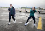 9 October 2022; Megan Campbell, left, and Lucy Quinn at Dublin Airport ahead of the team's chartered flight to Glasgow for their FIFA Women's World Cup 2023 Play-off against Scotland, at Hampden Park in Glasgow, on Tuesday next. Photo by Stephen McCarthy/Sportsfile