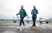 9 October 2022; Denise O'Sullivan, left, and Lily Agg at Dublin Airport ahead of the team's chartered flight to Glasgow for their FIFA Women's World Cup 2023 Play-off against Scotland, at Hampden Park in Glasgow, on Tuesday next. Photo by Stephen McCarthy/Sportsfile