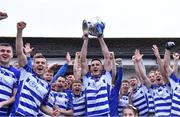 9 October 2022; Naas captain Eoin Doyle lifts the Dermot Bourke Cup after his side's victory in the Kildare County Senior Football Championship Final match between Clane and Naas at St Conleth's Park in Newbridge, Kildare. Photo by Piaras Ó Mídheach/Sportsfile