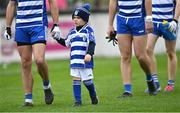 9 October 2022; Fionn Callaghan marches in the parade with his father Eamonn Callaghan of Naas before the Kildare County Senior Football Championship Final match between Clane and Naas at St Conleth's Park in Newbridge, Kildare. Photo by Piaras Ó Mídheach/Sportsfile