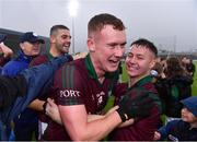 9 October 2022; Colm Murphy, left, and team-mate Jake Foster, both of Portarlington, celebrate  after their sides victory in the Laois County Senior Football Championship Final match between O'Dempseys and Portarlington at MW Hire O'Moore Park in Portlaoise, Laois. Photo by Sam Barnes/Sportsfile