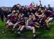 9 October 2022; Portarlington captain Keith Bracken, centre, and team-mates celebrate with the cup after their side's victory in the Laois County Senior Football Championship Final match between O'Dempseys and Portarlington at MW Hire O'Moore Park in Portlaoise, Laois. Photo by Sam Barnes/Sportsfile