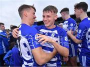 9 October 2022; Naas players Ailin McDermot, left, and Mark Maguire celebrate after their side's victory in the Kildare County Senior Football Championship Final match between Clane and Naas at St Conleth's Park in Newbridge, Kildare. Photo by Piaras Ó Mídheach/Sportsfile