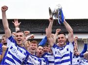 9 October 2022; Naas captain Eoin Doyle lifts the Dermot Bourke Cup after his side's victory in the Kildare County Senior Football Championship Final match between Clane and Naas at St Conleth's Park in Newbridge, Kildare. Photo by Piaras Ó Mídheach/Sportsfile