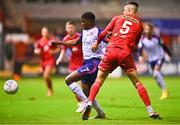 3 October 2022; Serge Atakayi of St Patrick's Athletic and Shane Griffin of Shelbourne during the SSE Airtricity League Premier Division match between Shelbourne and St Patrick's Athletic at Tolka Park in Dublin. Photo by Ben McShane/Sportsfile