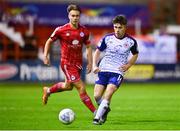 3 October 2022; Adam O'Reilly of St Patrick's Athletic and Matty Smith of Shelbourne during the SSE Airtricity League Premier Division match between Shelbourne and St Patrick's Athletic at Tolka Park in Dublin. Photo by Ben McShane/Sportsfile