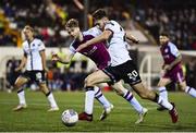 30 September 2022; Joe Adams of Dundalk and Andrew Quinn of Drogheda United during the SSE Airtricity League Premier Division match between Dundalk and Drogheda United at Casey's Field in Dundalk, Louth. Photo by Ben McShane/Sportsfile