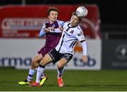 30 September 2022; Runar Hauge of Dundalk and Darragh Markey of Drogheda United during the SSE Airtricity League Premier Division match between Dundalk and Drogheda United at Casey's Field in Dundalk, Louth. Photo by Ben McShane/Sportsfile