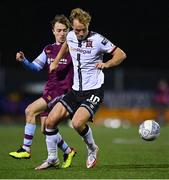 30 September 2022; Greg Sloggett of Dundalk and Darragh Markey of Drogheda United during the SSE Airtricity League Premier Division match between Dundalk and Drogheda United at Casey's Field in Dundalk, Louth. Photo by Ben McShane/Sportsfile