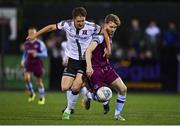 30 September 2022; John Martin of Dundalk in action against Andrew Quinn of Drogheda United during the SSE Airtricity League Premier Division match between Dundalk and Drogheda United at Casey's Field in Dundalk, Louth. Photo by Ben McShane/Sportsfile
