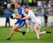 9 October 2022; Darragh Kirwan of Naas in action against John Lynch of Clane during the Kildare County Senior Football Championship Final match between Clane and Naas at St Conleth's Park in Newbridge, Kildare. Photo by Stephen Marken/Sportsfile