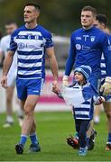 9 October 2022; Naas captain Eoin Doyle with his daughter Isla, age 5, in the parade before the Kildare County Senior Football Championship Final match between Clane and Naas at St Conleth's Park in Newbridge, Kildare. Photo by Piaras Ó Mídheach/Sportsfile