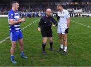 9 October 2022; Referee Brendan Cawley with team captains Eoin Doyle of Naas and Brian McLoughlin of Clane for the coin toss before the Kildare County Senior Football Championship Final match between Clane and Naas at St Conleth's Park in Newbridge, Kildare. Photo by Piaras Ó Mídheach/Sportsfile