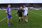 9 October 2022; Referee Brendan Cawley with team captains Eoin Doyle of Naas and Brian McLoughlin of Clane for the coin toss before the Kildare County Senior Football Championship Final match between Clane and Naas at St Conleth's Park in Newbridge, Kildare. Photo by Piaras Ó Mídheach/Sportsfile