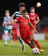 4 October 2022; Daniel Beukers of AZ Alkmaar and Mikey Raggett of Shamrock Rovers during the UEFA Youth League First Round 2nd Leg match between Shamrock Rovers and AZ Alkmaar at Tallaght Stadium in Dublin. Photo by Ben McShane/Sportsfile