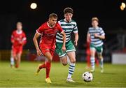 4 October 2022; Daniel Beukers of AZ Alkmaar and Mikey Raggett of Shamrock Rovers during the UEFA Youth League First Round 2nd Leg match between Shamrock Rovers and AZ Alkmaar at Tallaght Stadium in Dublin. Photo by Ben McShane/Sportsfile