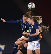 11 October 2022; Katie McCabe of Republic of Ireland in action against Martha Thomas, right, and Rachel Corsie of Scotland during the FIFA Women's World Cup 2023 Play-off match between Scotland and Republic of Ireland at Hampden Park in Glasgow, Scotland. Photo by Stephen McCarthy/Sportsfile