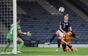 11 October 2022; Áine O'Gorman of Republic of Ireland in action against Nicola Docherty of Scotland during the FIFA Women's World Cup 2023 Play-off match between Scotland and Republic of Ireland at Hampden Park in Glasgow, Scotland. Photo by Stephen McCarthy/Sportsfile