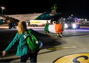 12 October 2022; Republic of Ireland's Amber Barrett acknowledges members of Dublin Airport Fire and Rescue Service Mick Power, left, and David Brennan on the team's return to Dublin Airport after securing their qualification for the FIFA Women's World Cup 2023 in Australia and New Zealand following their play-off victory over Scotland at Hampden Park on Tuesday. Photo by Stephen McCarthy/Sportsfile