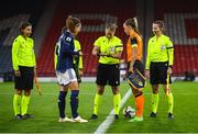 11 October 2022; Referee Esther Staubli with Republic of Ireland captain Katie McCabe and Scotland captain Rachel Corsie before the FIFA Women's World Cup 2023 Play-off match between Scotland and Republic of Ireland at Hampden Park in Glasgow, Scotland. Photo by Stephen McCarthy/Sportsfile