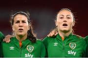 11 October 2022; Republic of Ireland players Niamh Fahey, left, and Megan Campbell stand for the playing of the National Anthem before the FIFA Women's World Cup 2023 Play-off match between Scotland and Republic of Ireland at Hampden Park in Glasgow, Scotland. Photo by Stephen McCarthy/Sportsfile